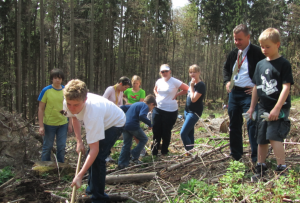 FIS students plant new trees in a storm-damaged section of the Taunus Mountains, which surround the school surrounding